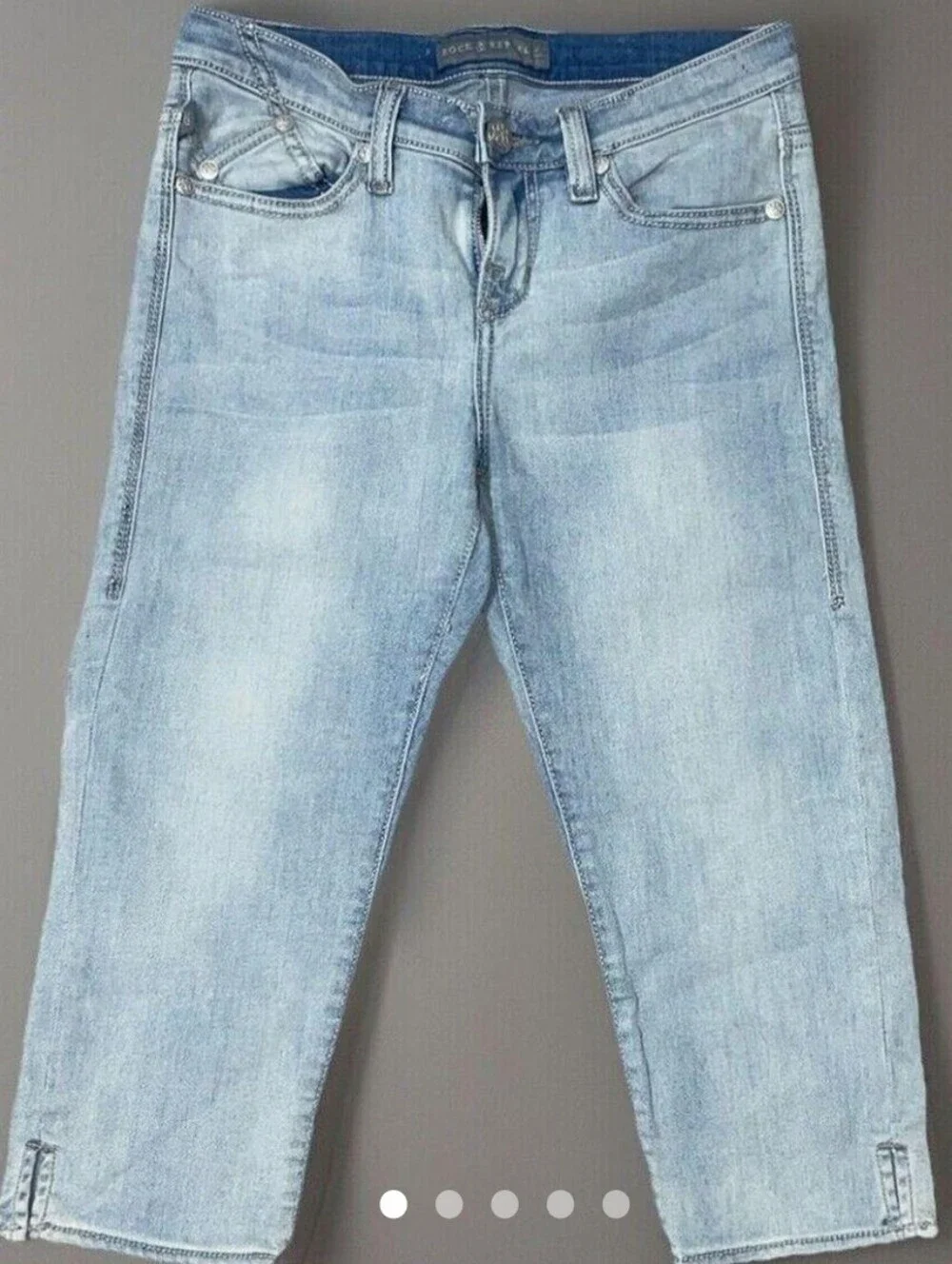 Rock & Republic Light Blue Jean Capris with Rhinestone Wing Pockets.
